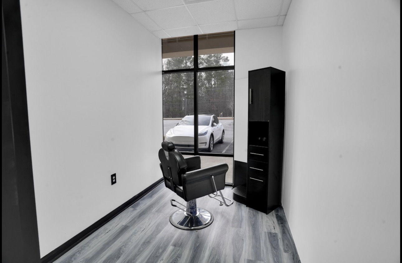 Private suite with styling chair and natural light